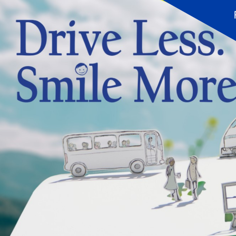 Drive Less, Smile More with cars and trains passing